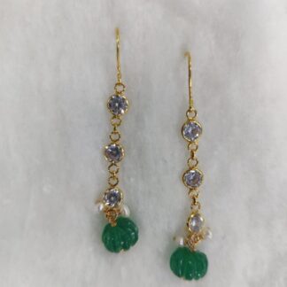 Gold earrings are 1.75 inches in length.