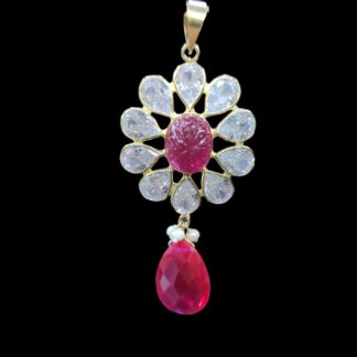 Pendant has a carved red onyx stone  in .900 grams of 14 kt gold.